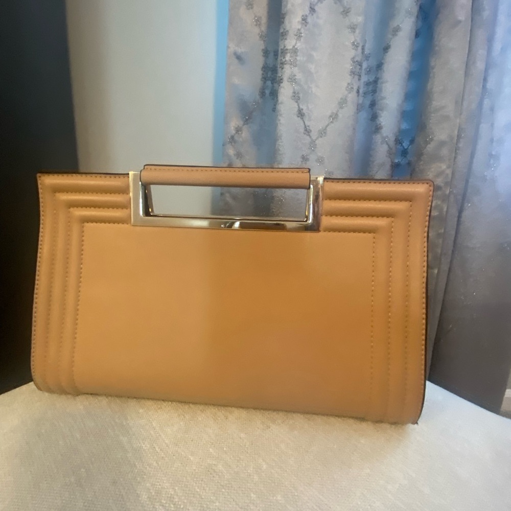 Fashion clutch bag. Magnetic closure, gold tone chain shoulder strap.